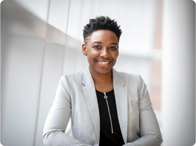 Woman in suit smiling