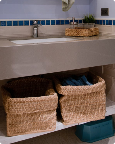Two canvas bins underneath sink
